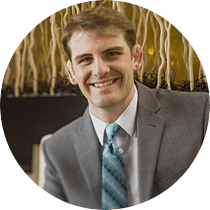 dental marketing speaker Justin Morgan smiling in suit